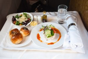 My first business class in-flight meal! In business class, you get to pick options from a menu, and there are separate appetizers and a main course! This appetizer had crab meat, and it was quite good! The breakfast eggs were kinda gross though. :P